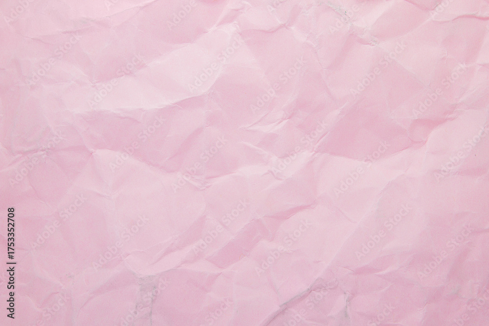 Fototapeta premium Soft pink wrinkled paper texture background for design and packaging mockups