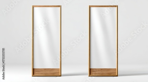 Two minimalist standing signs with wooden frames are shown.