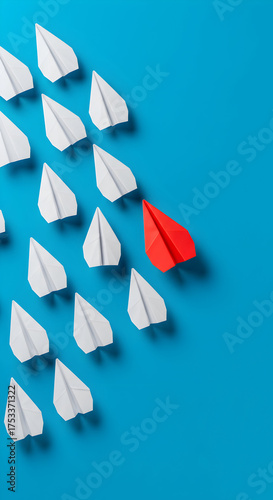 Paper airplanes formation on blue background