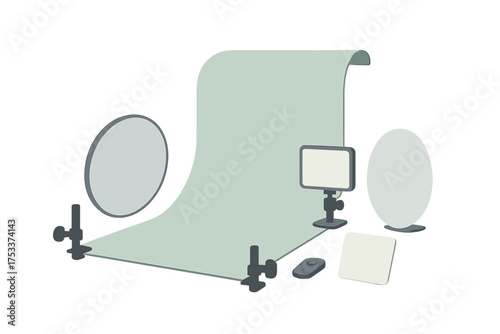 Portable photo studio setup with seamless background and lighting equipment