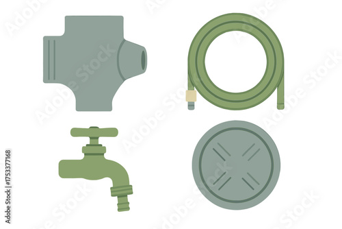 Set of garden plumbing fixtures and coiled water hose