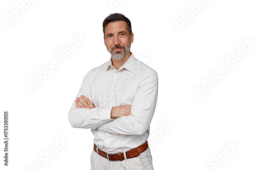 Mature man standing confidently, smiling with arms crossed, wearing a white shirt and light pants. Transparent background