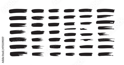 A collection of diverse black ink brush stroke textures and artistic smudges on a clean white background