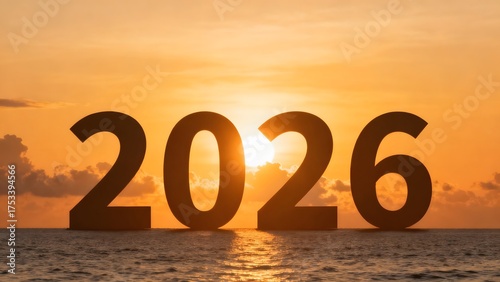 Sunset over ocean with 2026 text