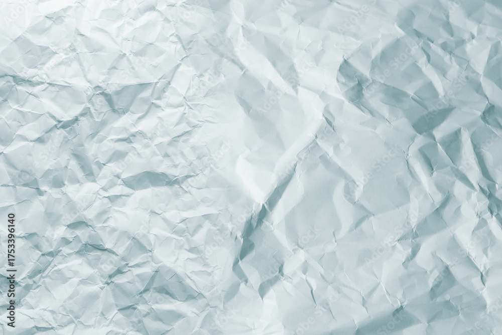 Obraz premium Crumpled white paper background.