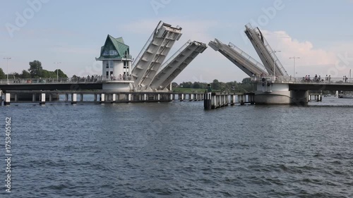 Modern Schlei bascule drawbridge in Kappeln slowly closing over water