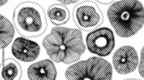 This image showcases a monochrome halftone pattern featuring various donut-shaped designs with unique inner elements, creating a dynamic, eye-catching, black and white design
