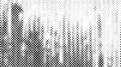 Black dotted texture fading into white showcases a half-tone gradient pattern and retro aesthetic with dark, circular shapes creating a vintage-style background design