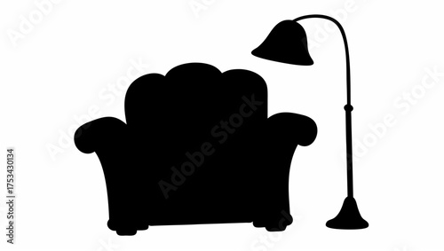 Silhouette of a comfortable armchair with a high back and a floor lamp with a conical lampshade near it