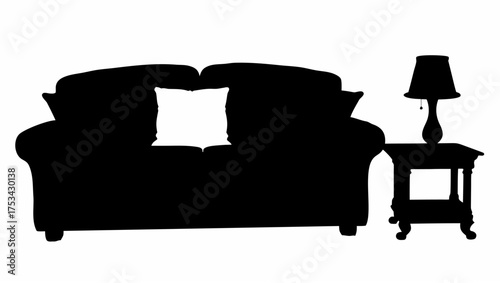 Silhouette of a couch with a white pillow next to a lamp on a small table in a simple monochrome design