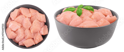 Raw diced chicken fillet in ceramic bowl isolated on white background. Top view. Flat lay