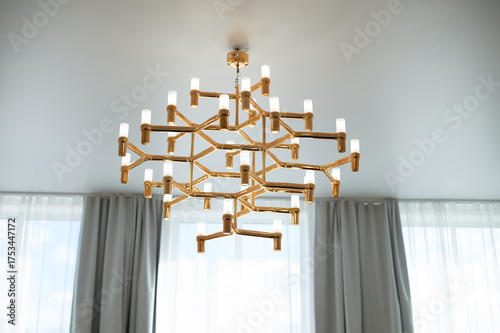 Wallpaper Mural A golden chandelier with many light bulbs. Style, minimalism and luxury, Torontodigital.ca