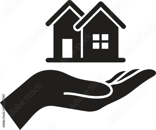 Hand holding two houses representing real estate and home ownership