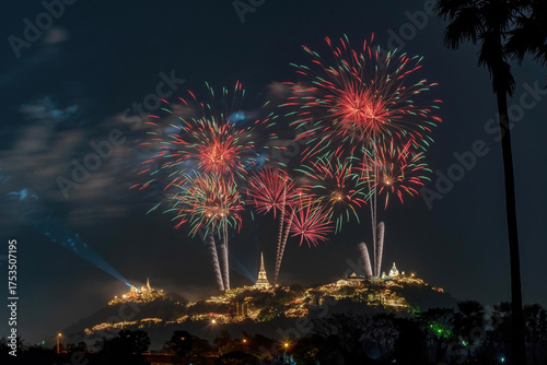 Beautiful fireworks over Phra Nakhon Khiri (Khao Wang Historical Park) in Phetchaburi Province, Thailand. The spectacular display takes place above the beautifully lit palace and temples.