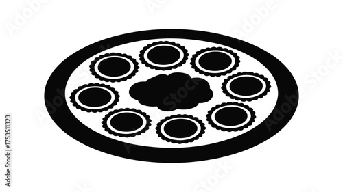 Abstract black and white circular design with a central dark blob and surrounding smaller circles