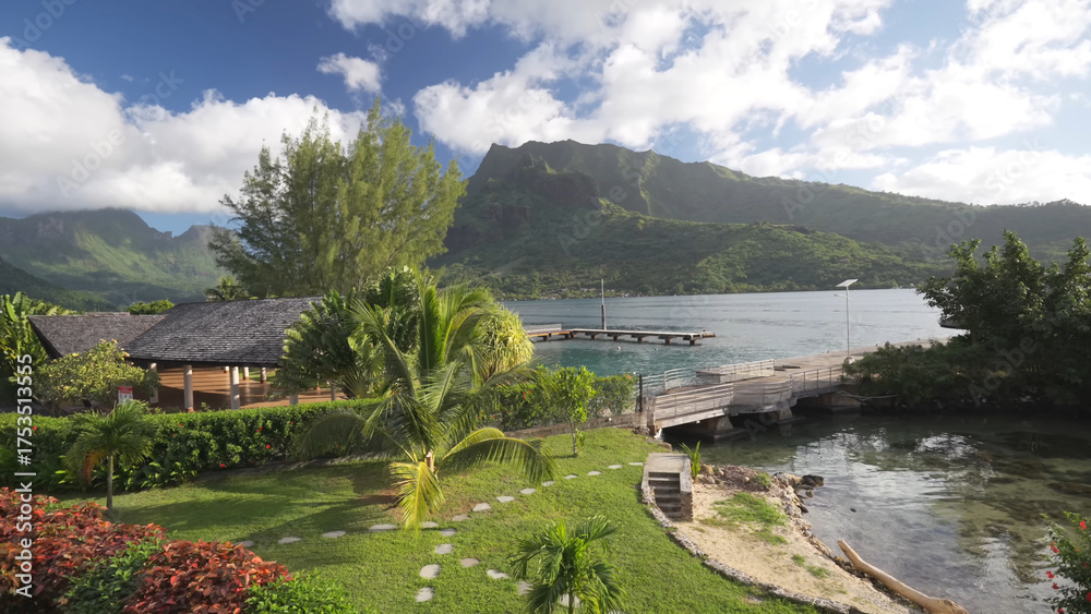 Fototapeta premium Luxury resort photo of Moorea paradise islands with tropical trees. Photography with ocean, sky with clouds. French Polynesia. Pacific Ocean.