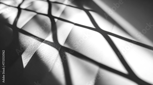 Shadowy Grid: Abstract Monochrome design for web, backgrounds, marketing, or texture.