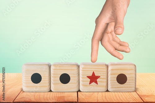 Canvas Print Differentiation, marketing strategy. Wooden blocks with star