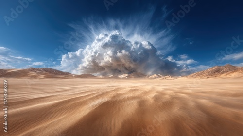 A breathtaking desert scene featuring sweeping sand dunes beneath a powerful cloud formation, symbolizing nature's vastness and the contrast between earth and sky.