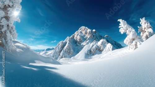 A breathtaking winter landscape features majestic snow-covered mountains under a clear blue sky, evoking a sense of adventure and peace in the pristine, untouched wilderness.