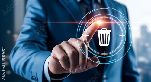 A businessman in a blue suit is depicted touching a digital interface with a trash can icon, symbolizing data deletion, removal of information, or the concept of digital waste management