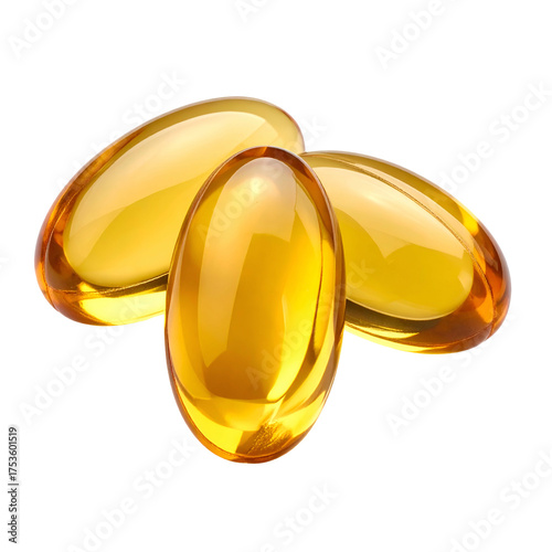 Close-up of three, translucent golden softgel capsules against a black background