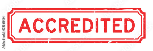 Red stamp with the word accredited in bold letters