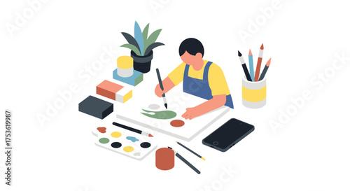 A person painting on a canvas, surrounded by art supplies, phone face down