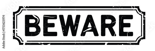 Distressed beware warning sign with bold black text