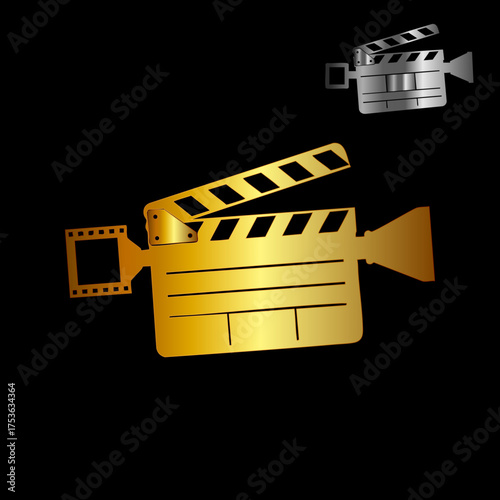 Golden film clapperboard with camera shape on black background for movie production