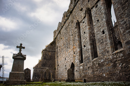 Konstfotografi Imposing medieval castle ruins stand amidst a serene landscape, evoking the grandeur of a bygone era