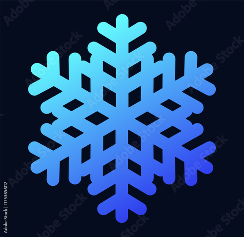 A detailed blue snowflake design stands out against a dark background, capturing a winter essence.