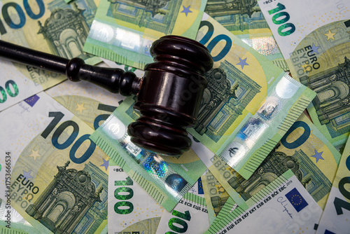 Euro banknotes with judge gavel, legal justice, regulation and business corruption concept