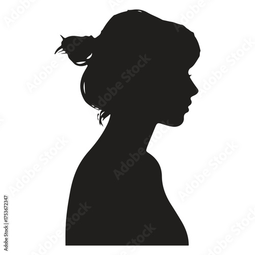 Profile silhouette of a woman with hair in a bun silhouette