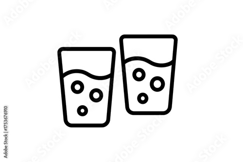 Two clear glasses filled with bubbles and refreshing liquid placed side by side on a plain background