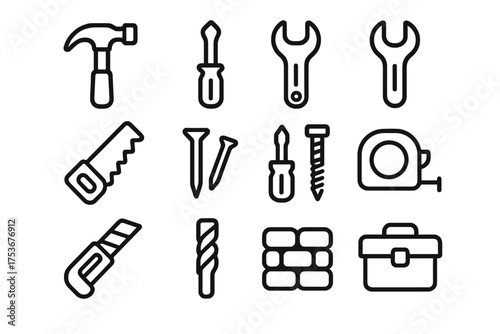 Collection of various hand tools including hammers, screwdrivers, and wrenches arranged for a crafting project