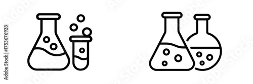 Different laboratory glassware featuring beakers and test tubes with liquid bubbles, ideal for science or chemistry discussions