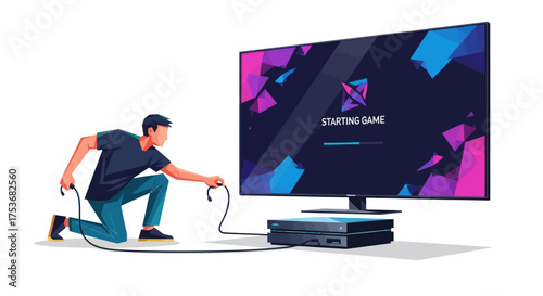 Young man connecting game console to large screen television for gaming.