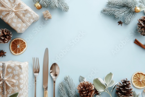 Festive Table Setting With Gifts, Pinecones, and Dried Oranges for a Winter C...