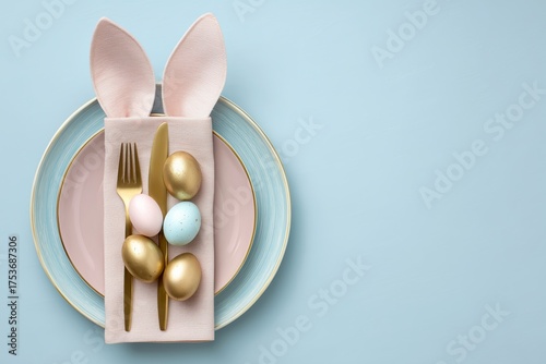 Decorated Easter Table Setting With Bunny Ears and Colorful Eggs on a Soft Bl...