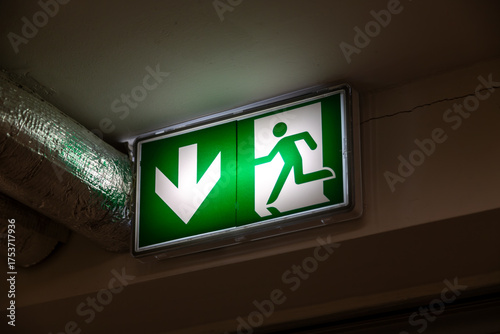 Emergency exit green light sign. 