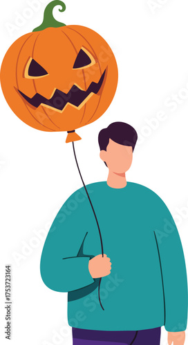 Man holding Halloween pumpkin balloon celebrating autumn festival with festive orange decoration and spooky face design 