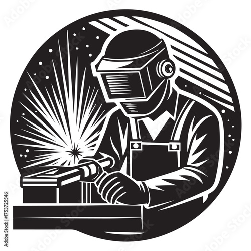 welder working on a laptop
