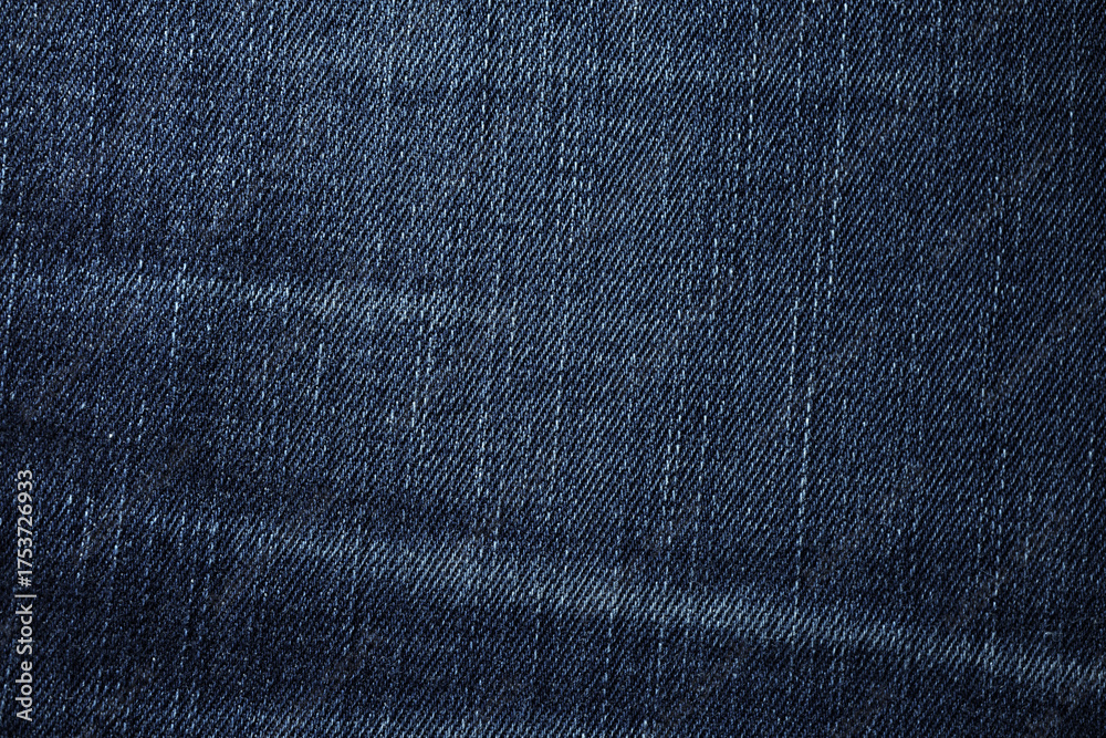 Naklejka premium Close-Up of Dark Blue Denim Fabric Texture