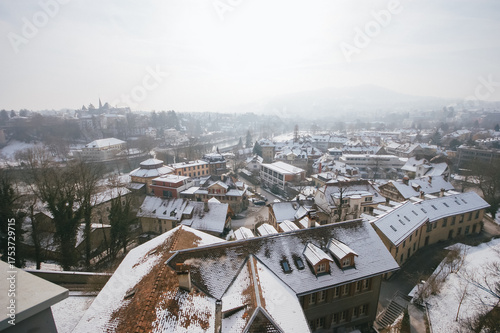 Snow-covered rooftops of Bern city in winter