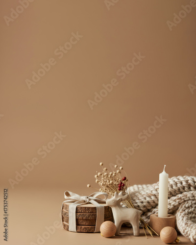 Scandinavian Christmas Background with Wooden Coasters, Porcelain Reindeer, Candle, Knitted Blanket, and Wooden Ornaments – Cozy Nordic Holiday Decor in Warm Beige Tones with Copy Space
