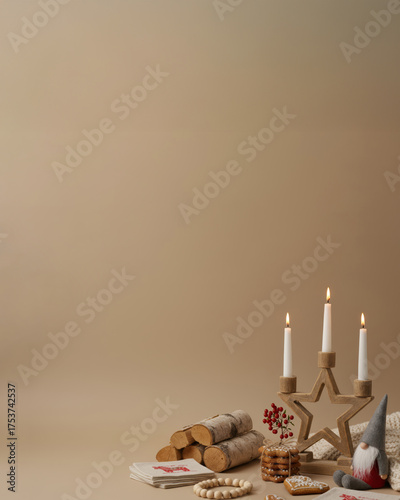 Scandinavian Christmas Scene with Birch Firewood, Gingerbread Cookies, Star Candle Holder, and Gnome – Rustic Nordic Holiday Decor in Warm Beige Tones with Copy Space