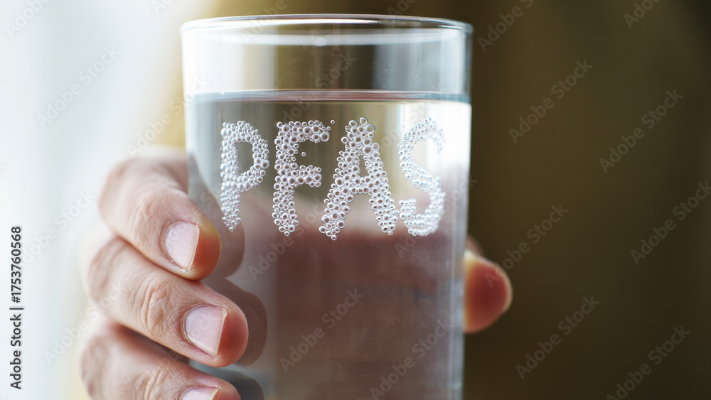 Obraz premium PFAS in drinking water, toxic contamination risk, hand holding glass, invisible chemical danger, health hazard alert, polluted tap water, forever chemicals, unsafe consumption