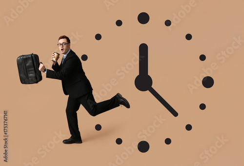 Young man in suit running w...