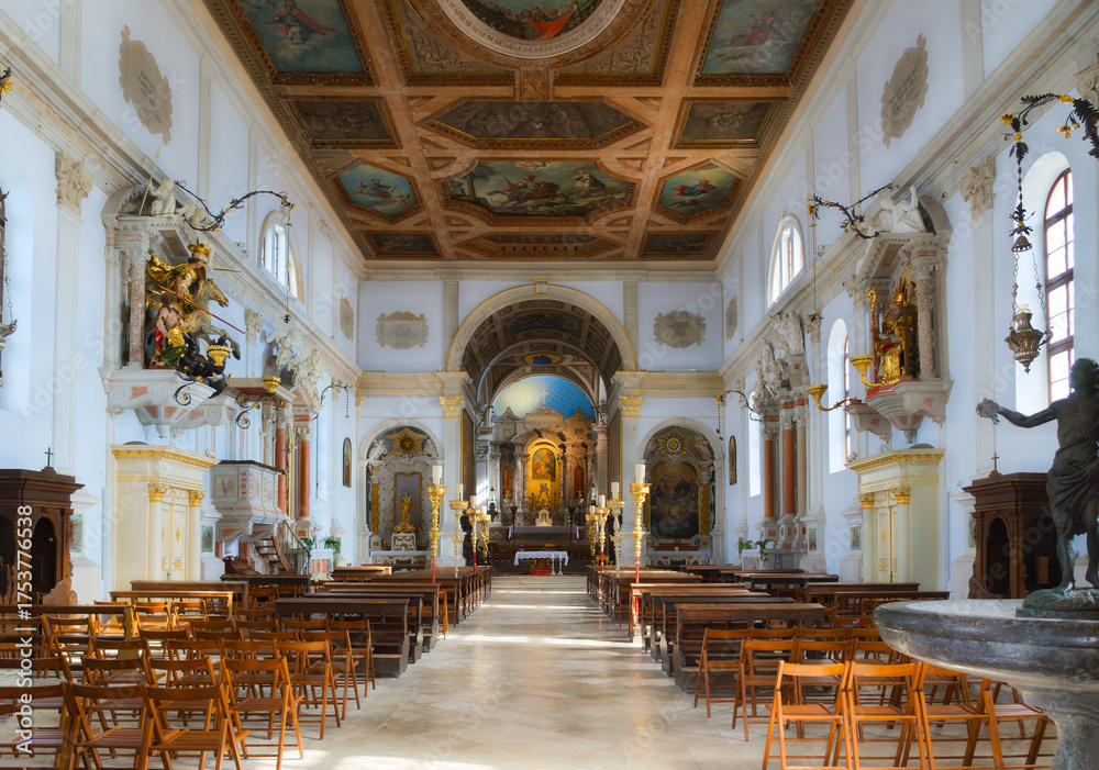Fototapeta premium Interior view of the 12th century Parish Church of Saint George whose bell tower is the major landmark in the seaside town of Piran, Slovenia, Istrian Peninsula.